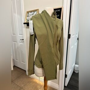 Green Lululemon leggings and casual hoodie